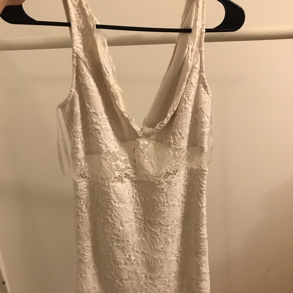 Bebe white open cut lace dress
